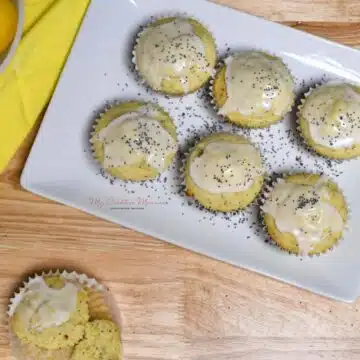 Looking down on a plate of lemon poppyseed muffins.
