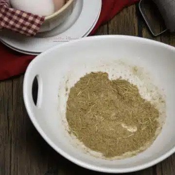 A mixing bowl with the homemade poultry seasoning in.