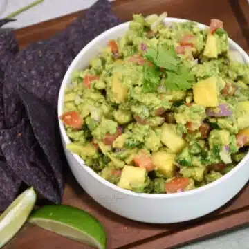 Looking into a bowl filled with delicious pineapple guacamole.