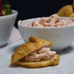 A croissant filled with whipped honey strawberry butter