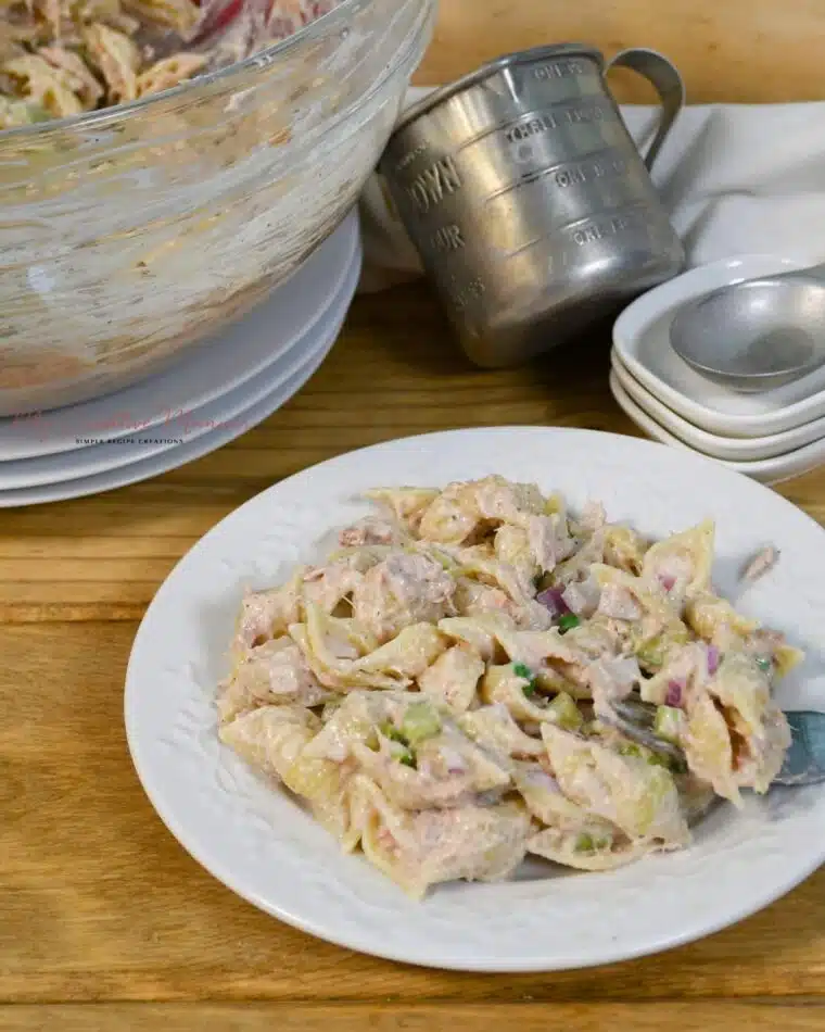 A plate that has the easy tuna pasta salad recipe on it.